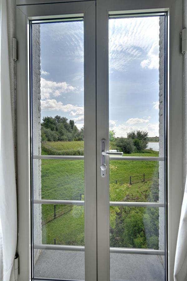 B&B Pompgebouw Aan De Rijn Tolkamer Esterno foto